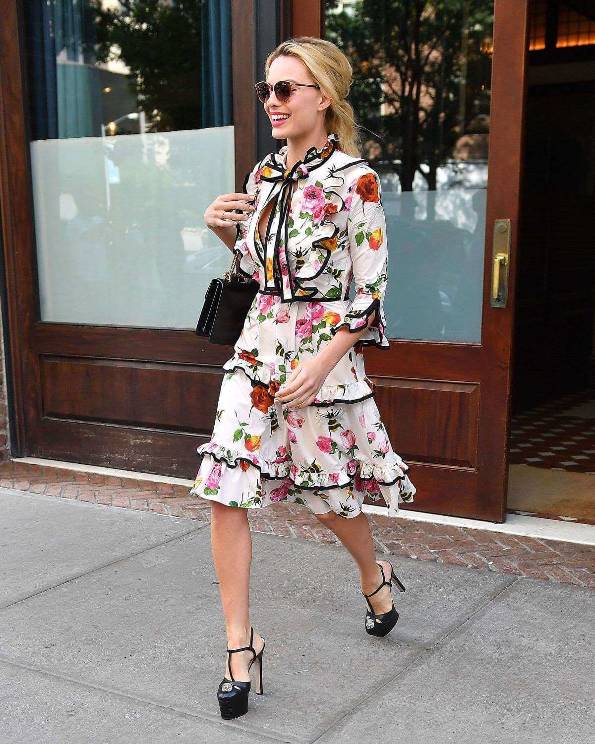 Margot Robbie in printed dress out in New York