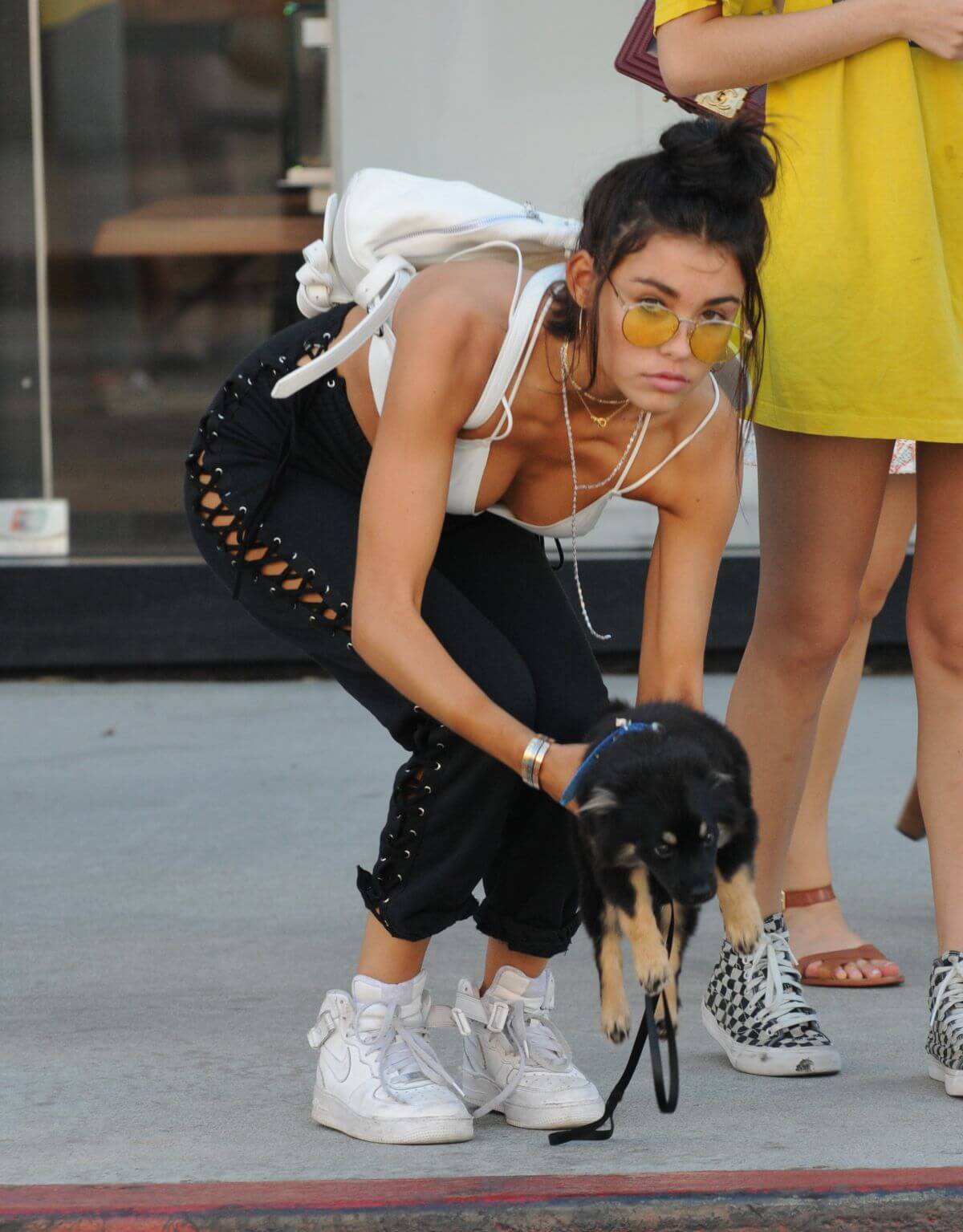 Madison Beer Stills With Her Dog Out in Los Angeles