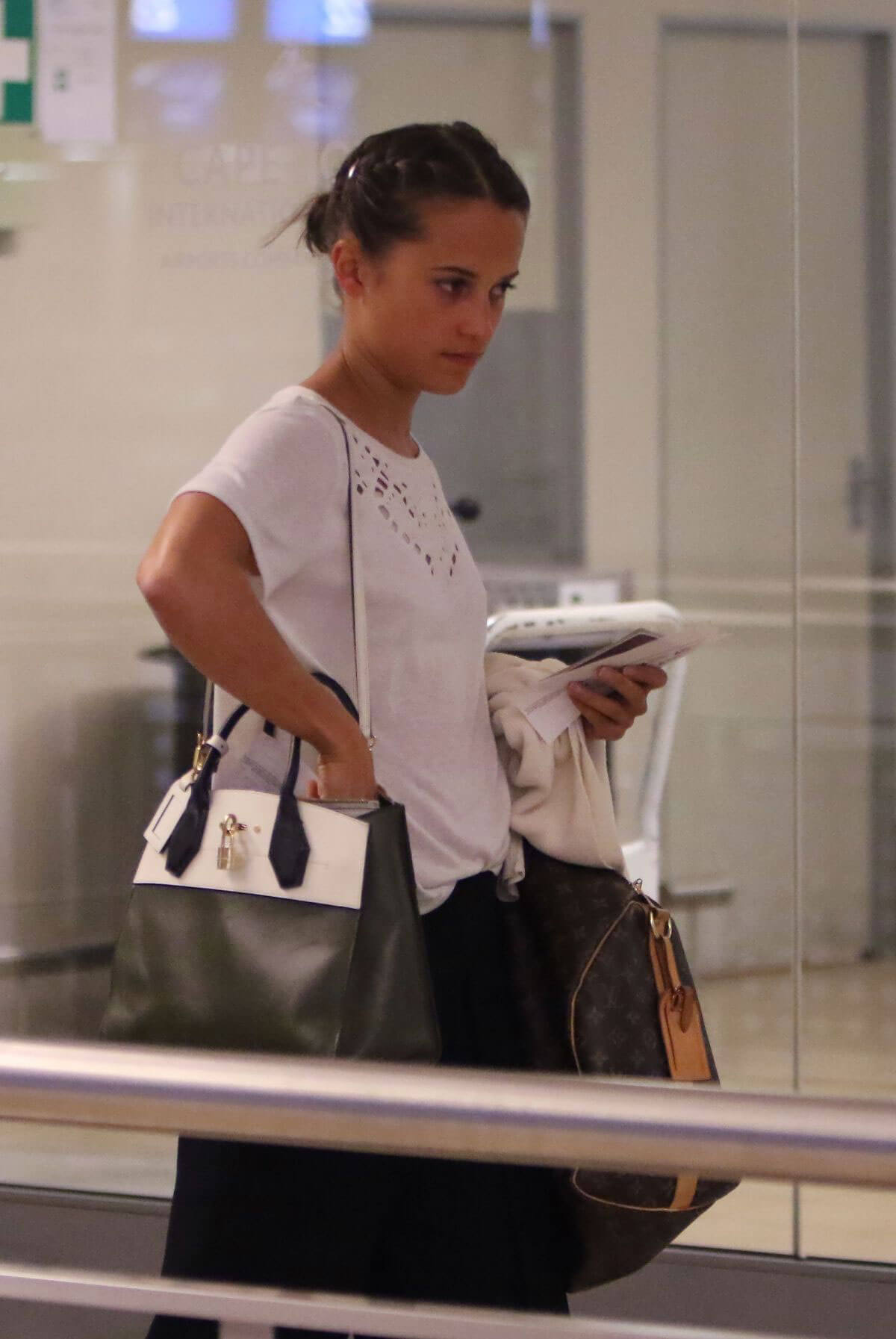 Alicia Vikander Stills at Cape Town International Airport in South Africa