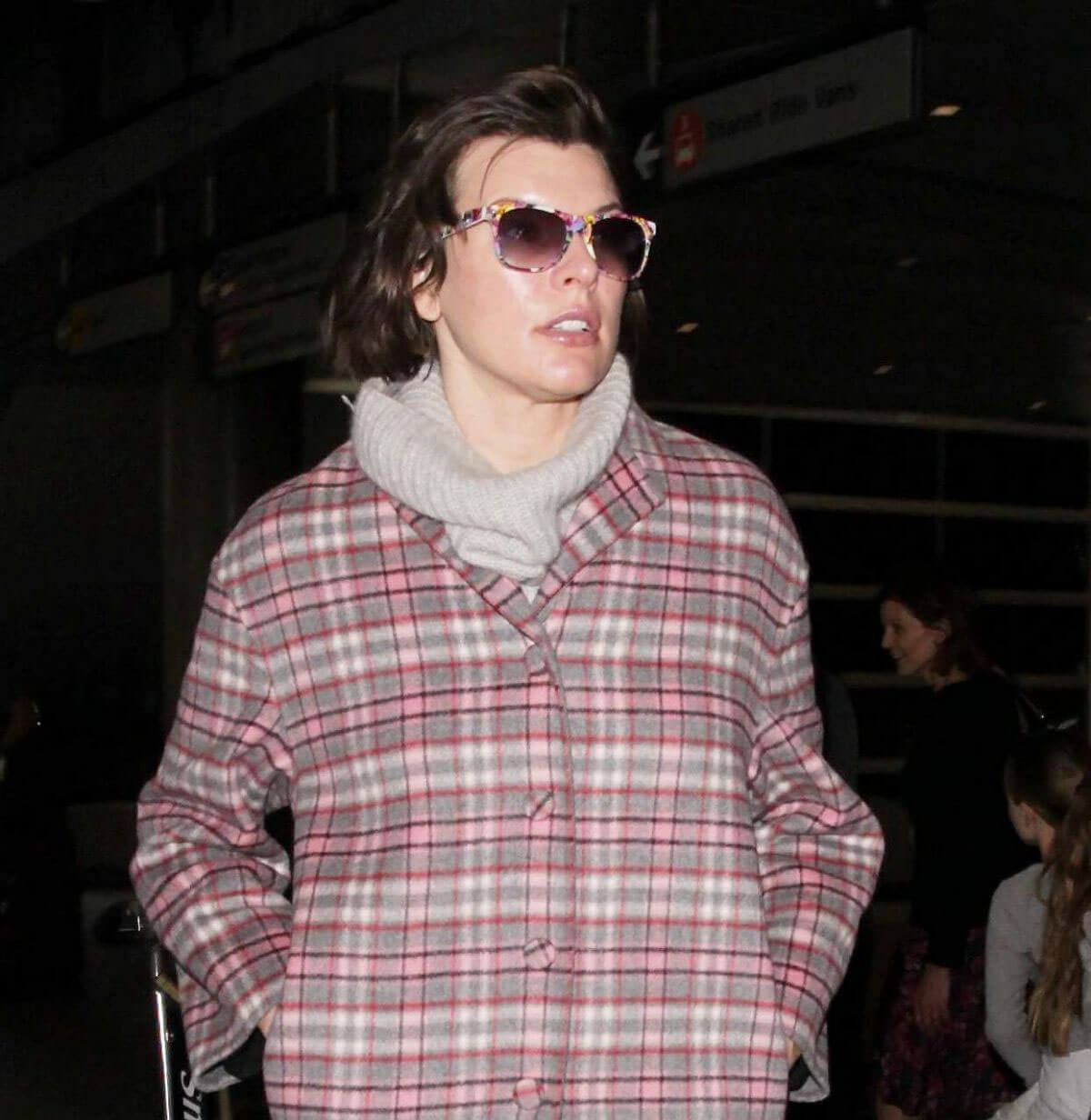 Milla Jovovich at Los Angeles International Airport