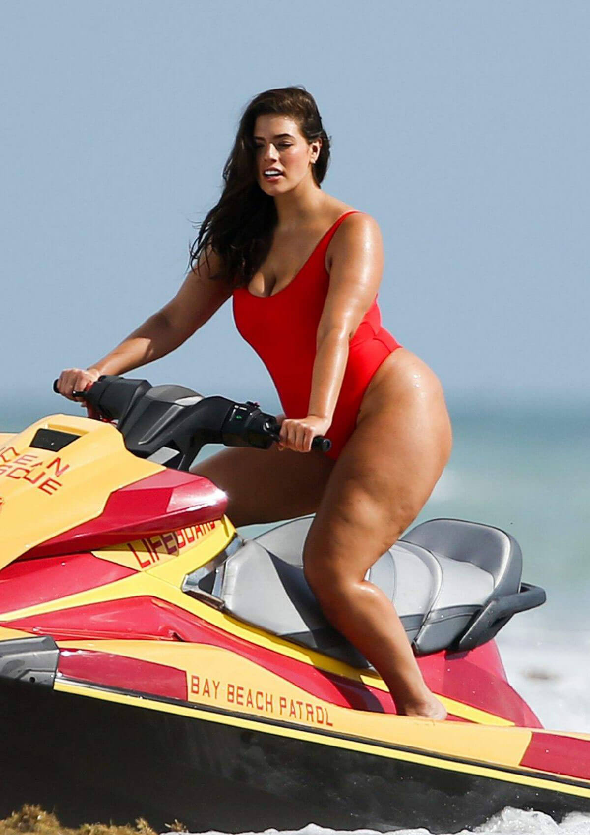 Ashley Graham Stills in Swimsuit at Baywatch Theme Photoshoot in Miami