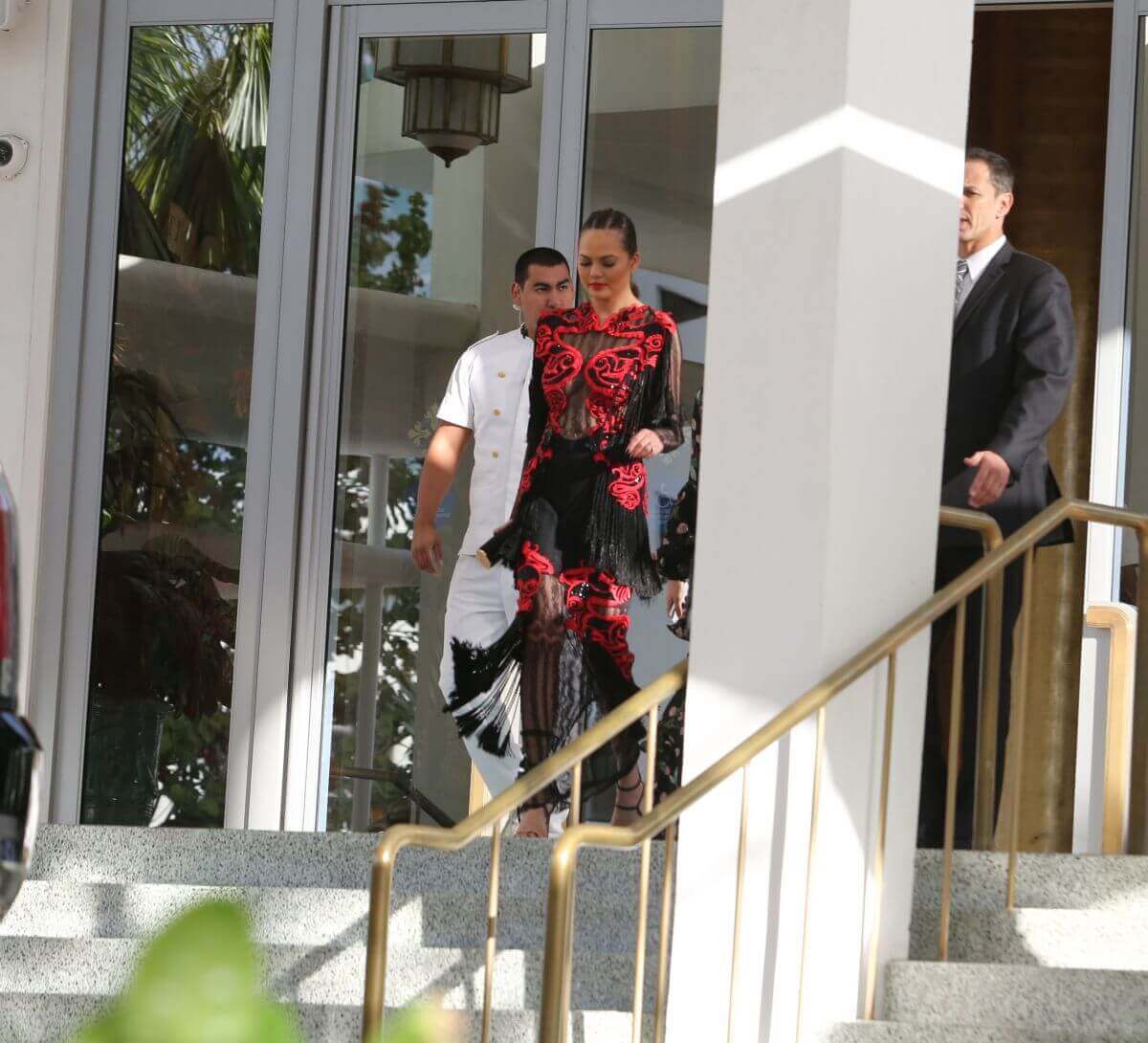 Chrissy Teigen Stills Leaves Her Hotel in Miami