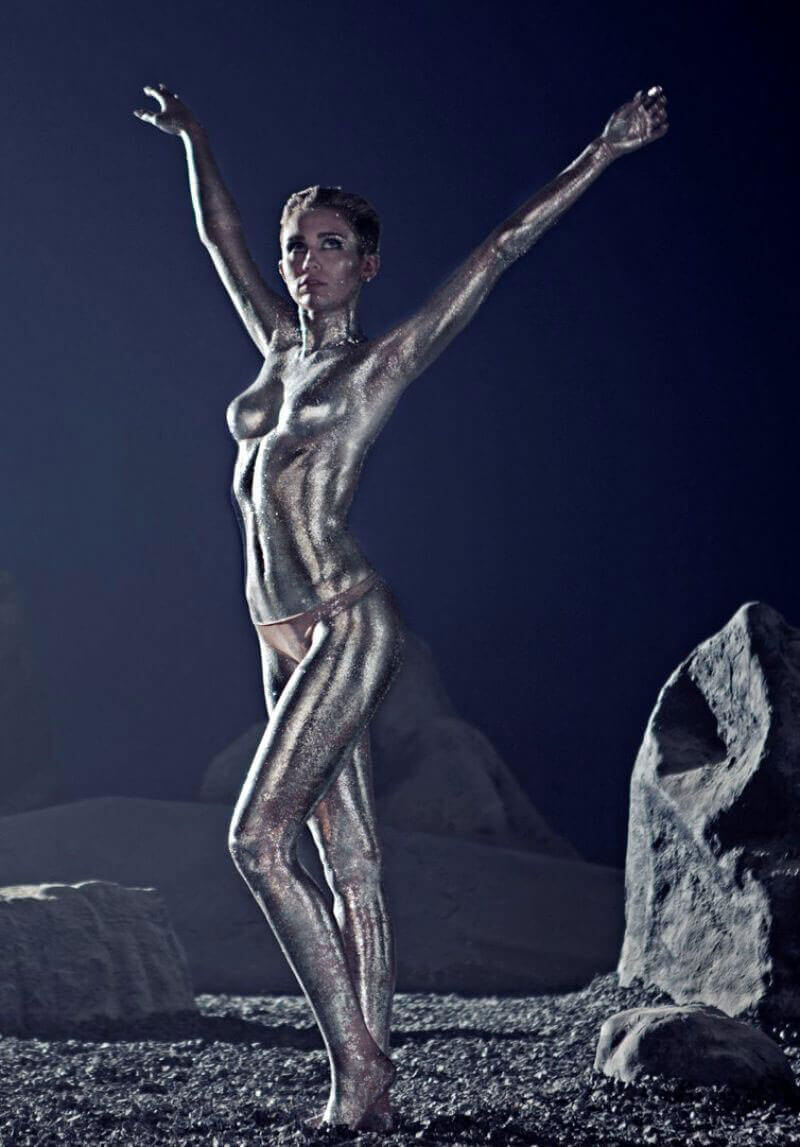 Miley Cyrus Stills Covered in Silver Body Paint Photos