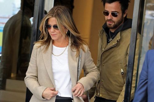 Jennifer Aniston and Justin Theroux Stills Leaving Chanel Store in Paris 9