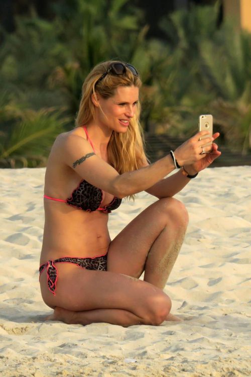 Michelle Hunziker Stills in Bikini on the Beach in Dubai 14