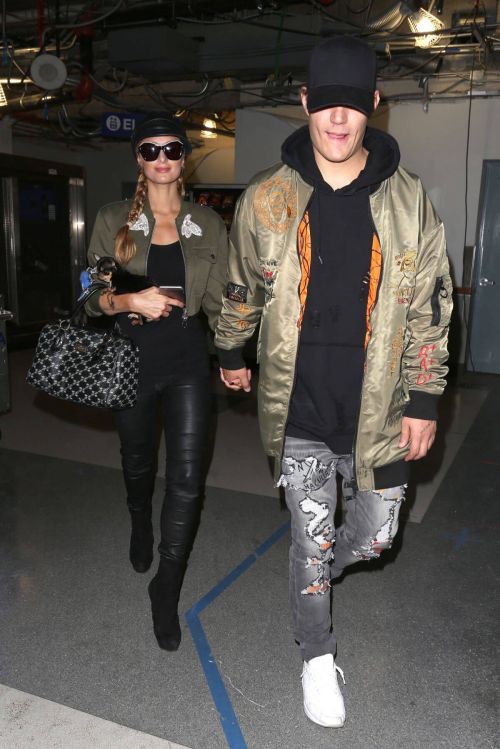 Paris Hilton and Chris Zylka Stills at LAX Airport in Los Angeles