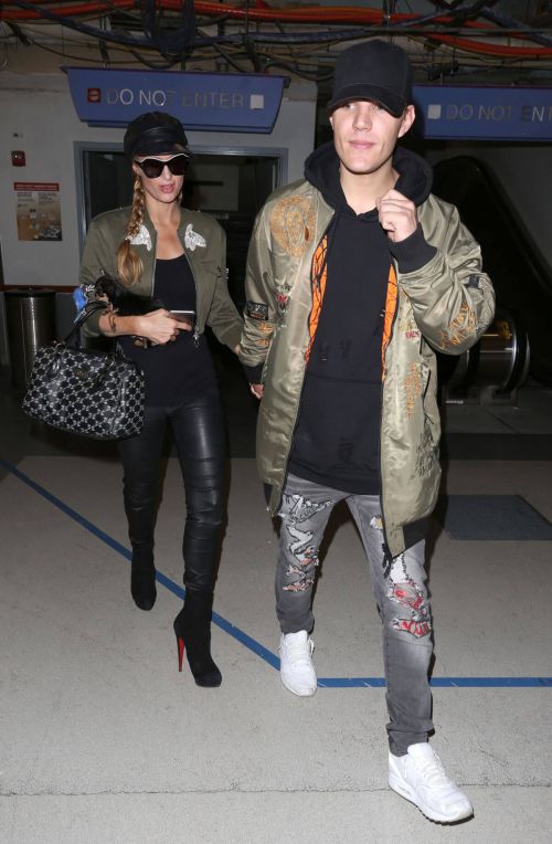 Paris Hilton and Chris Zylka Stills at LAX Airport in Los Angeles 1