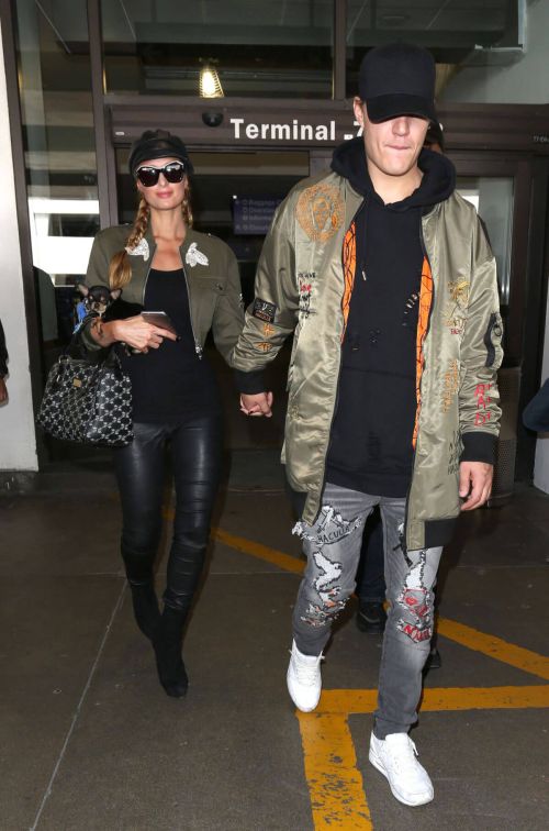 Paris Hilton and Chris Zylka Stills at LAX Airport in Los Angeles 4