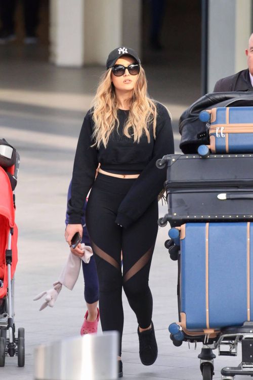 Perrie Edwards Stills at Heathrow Airport in London 1