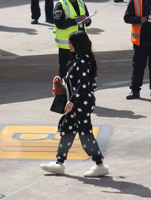 Kylie Jenner Boarding at a Private Jet in Cusco 1