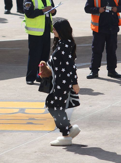 Kylie Jenner Boarding at a Private Jet in Cusco 4