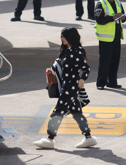 Kylie Jenner Boarding at a Private Jet in Cusco 7