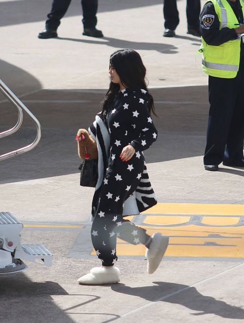 Kylie Jenner Boarding at a Private Jet in Cusco 8