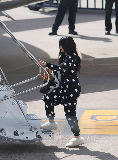 Kylie Jenner Boarding at a Private Jet in Cusco 10