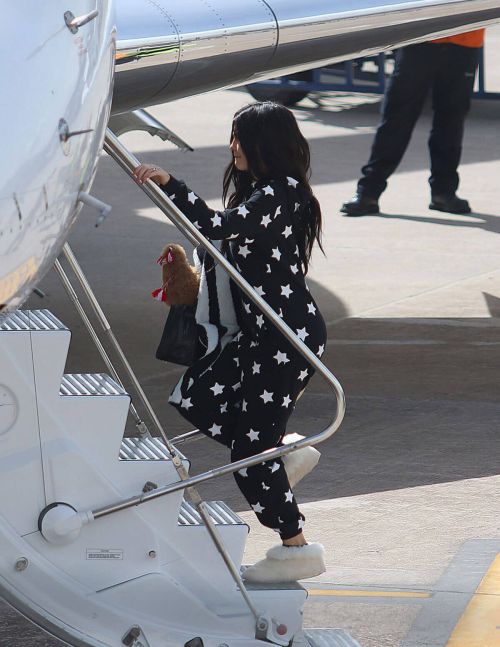 Kylie Jenner Boarding at a Private Jet in Cusco 11