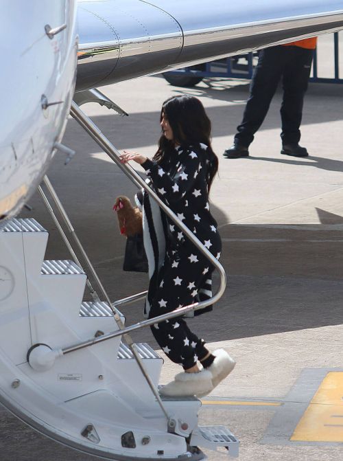 Kylie Jenner Boarding at a Private Jet in Cusco 12