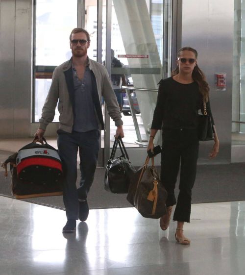 Alicia Vikander and Michael Fassbender Stills Departing from Toronto Pearson International Airport 1