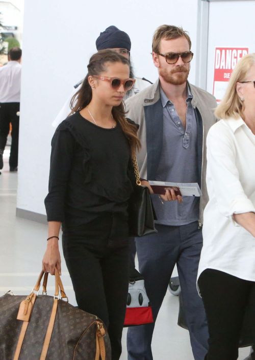 Alicia Vikander and Michael Fassbender Stills Departing from Toronto Pearson International Airport 9