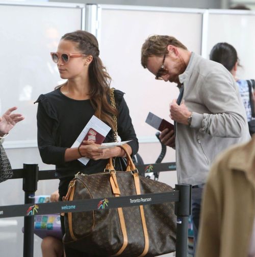 Alicia Vikander and Michael Fassbender Stills Departing from Toronto Pearson International Airport 10