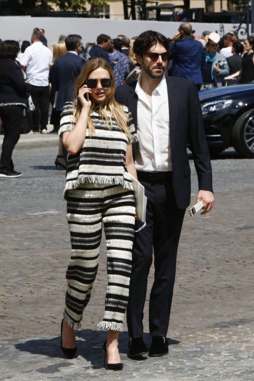 Elizabeth Olsen Stills Looking for a Cab in Paris 1