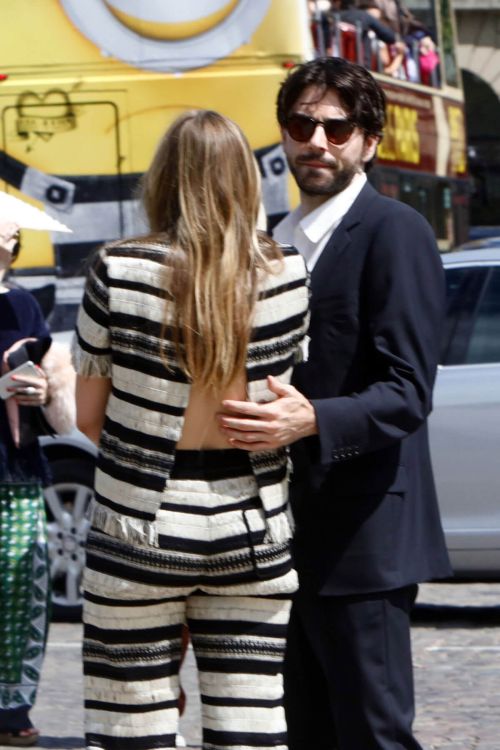 Elizabeth Olsen Stills Looking for a Cab in Paris 4