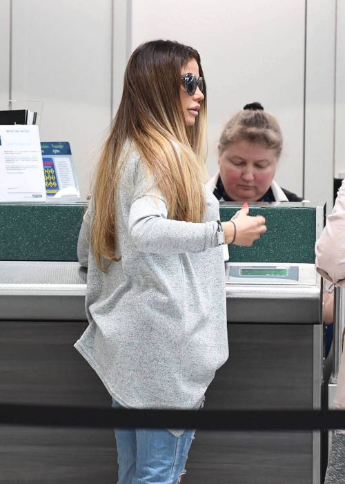 Katie Price Stills at Gatwick Airport in London 9