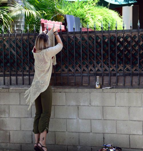 Paris Jackson Stills Going Over a Wall in Los Angeles 13