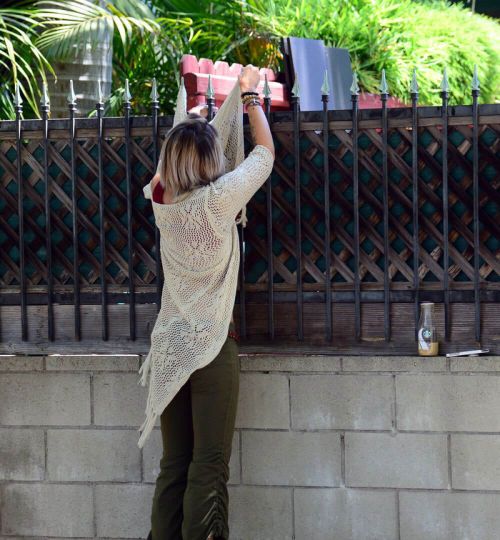 Paris Jackson Stills Going Over a Wall in Los Angeles 14