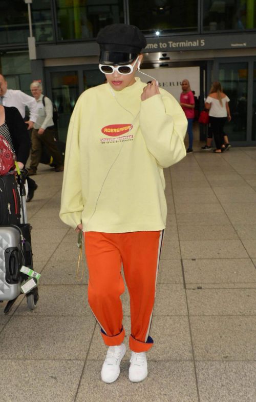 Rita Ora Stills at Heathrow Airport in London 13