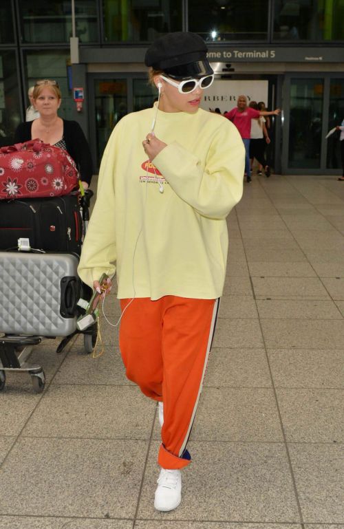 Rita Ora Stills at Heathrow Airport in London 15