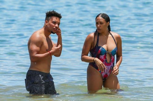 Tia Mowry Stills in Swimsuit on the Beach in Hawaii 5