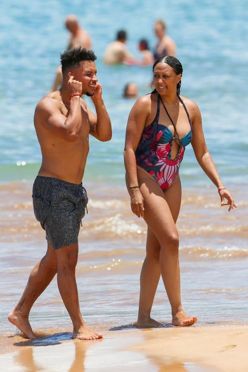 Tia Mowry Stills in Swimsuit on the Beach in Hawaii 9