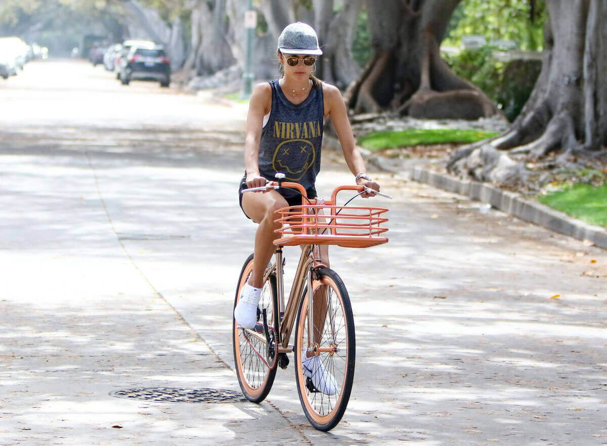 Alessandra Ambrosio rides her cycling during workout in Los Angeles