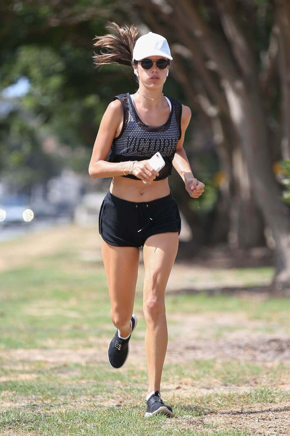 Alessandra Ambrosio wearing shorts shows off toned thighs in Los Angeles