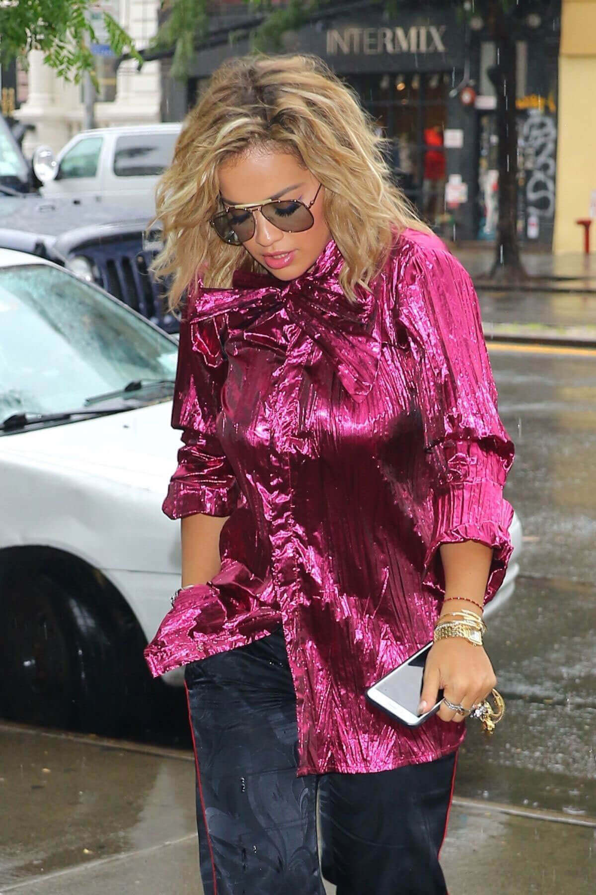 Rita Ora Stills wearing Purple Shirt and Black Bottom Out and About in New York