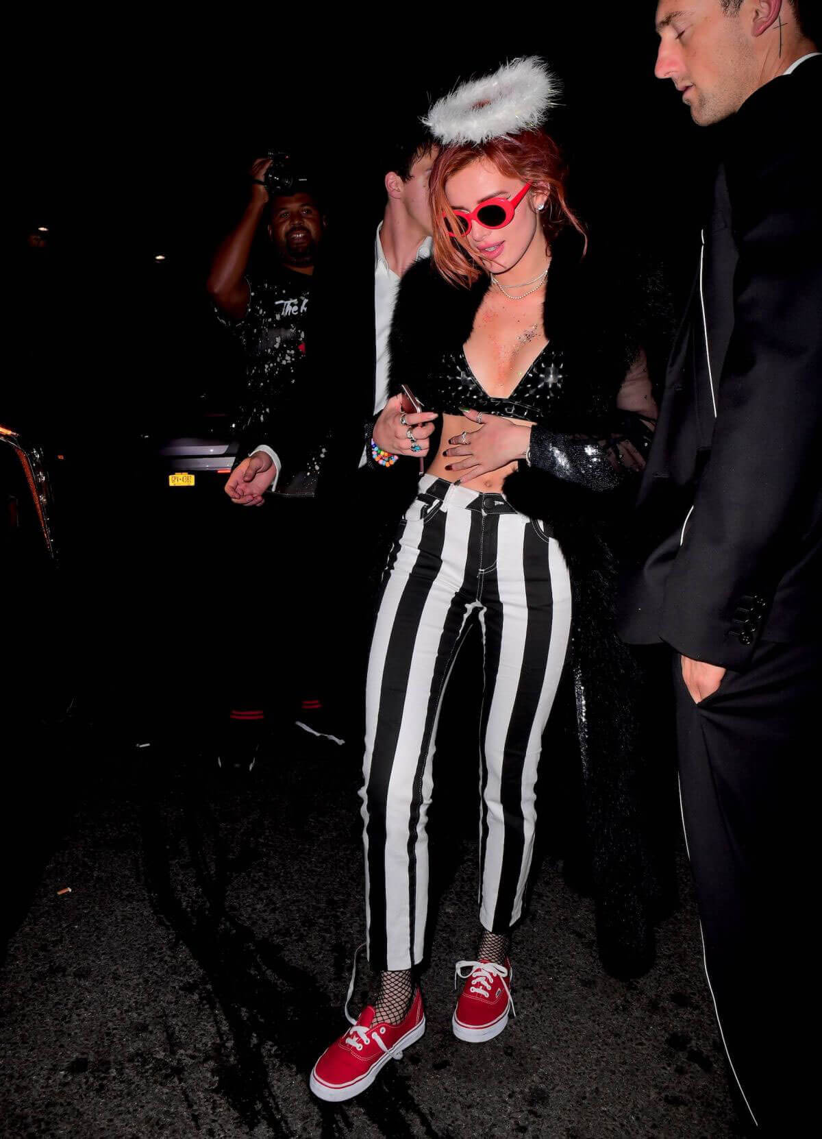 Bella Thorne wears Stripped Pants Arrives at Party in New York