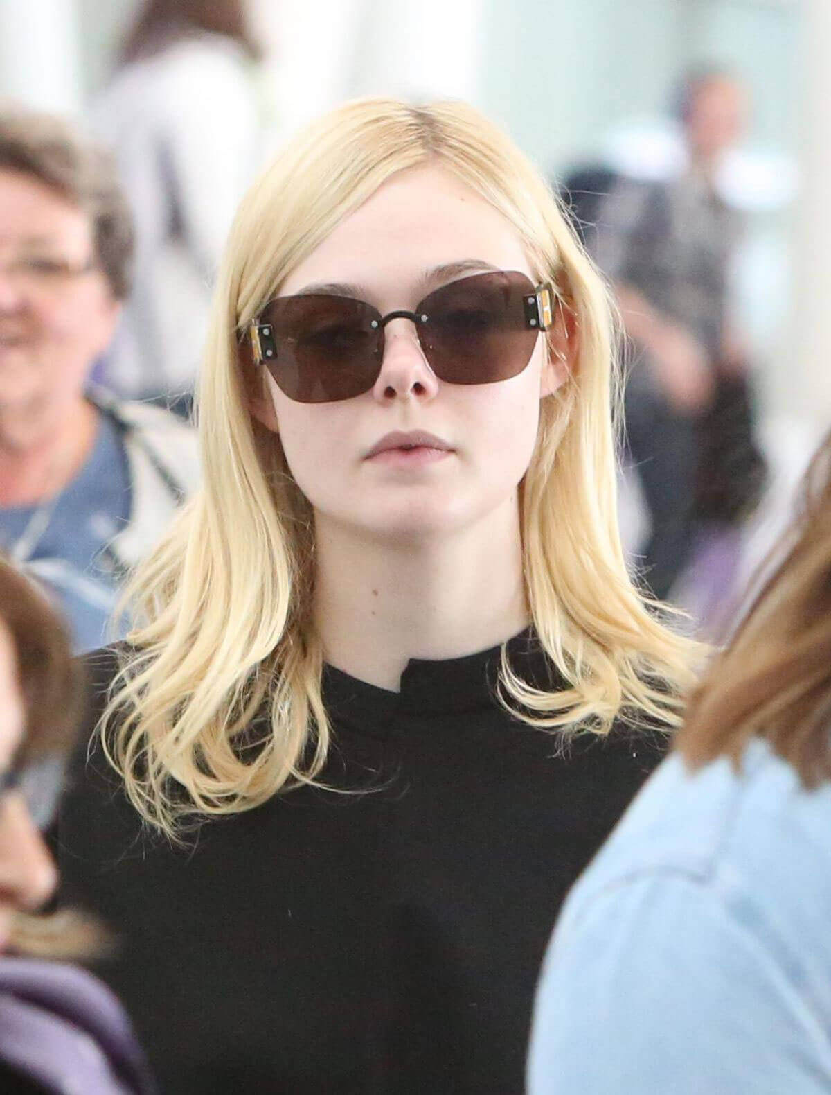 Elle Fanning Stills at Toronto Airport Images