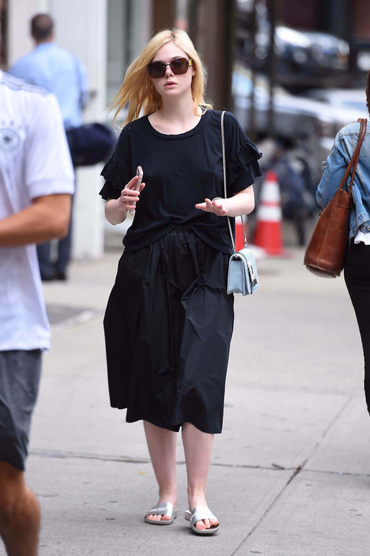 Elle Fanning wears All Black Stills Out in New York