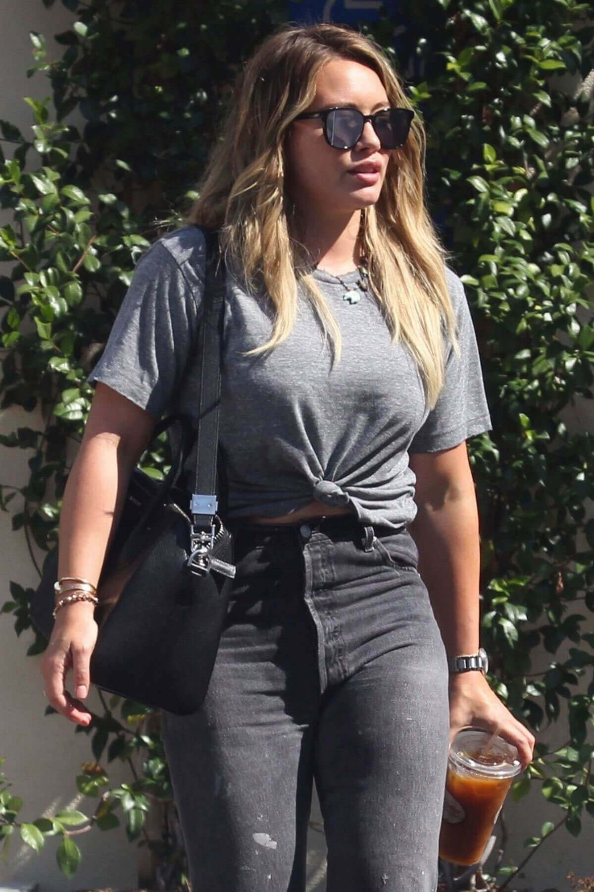 Hilary Duff wears tshirt and black jeans leaving a meeting in Los Angeles