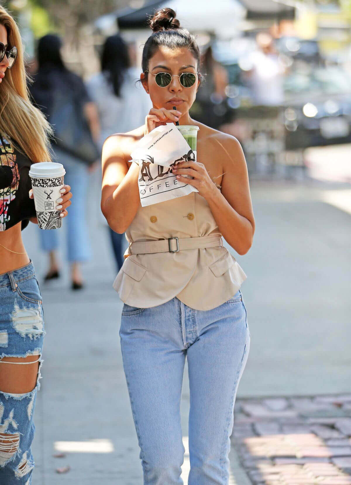 Kourtney Kardashian wears Ripped Jeans Out in Los Angeles