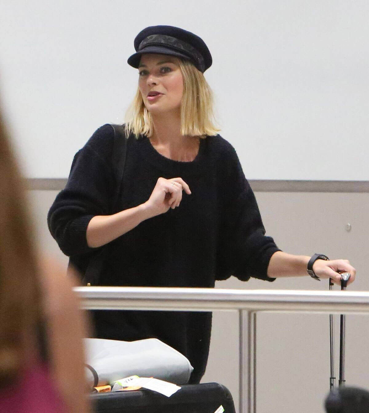 Margot Robbie Arrives with Luggage at Toronto International Airport