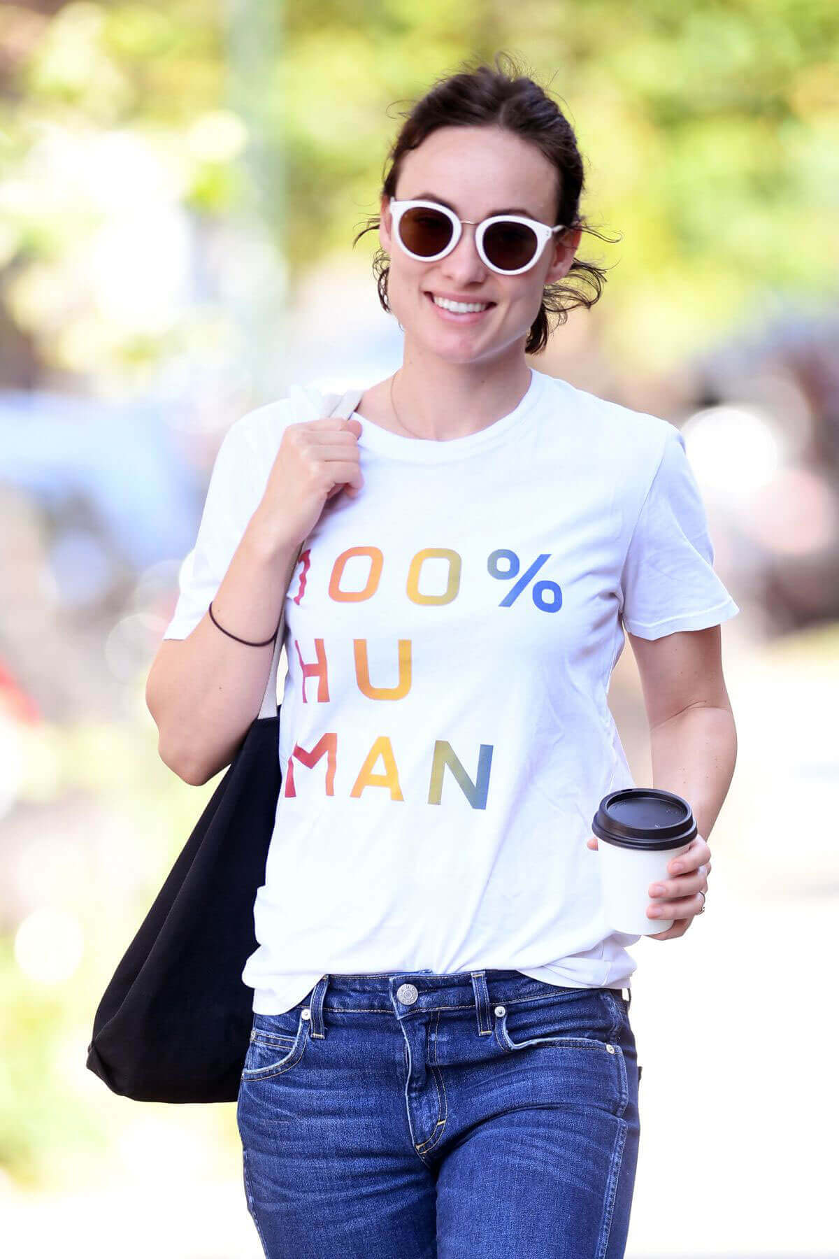 Olivia Wilde wears "100% HU MAN" T-Shirt Out in New York