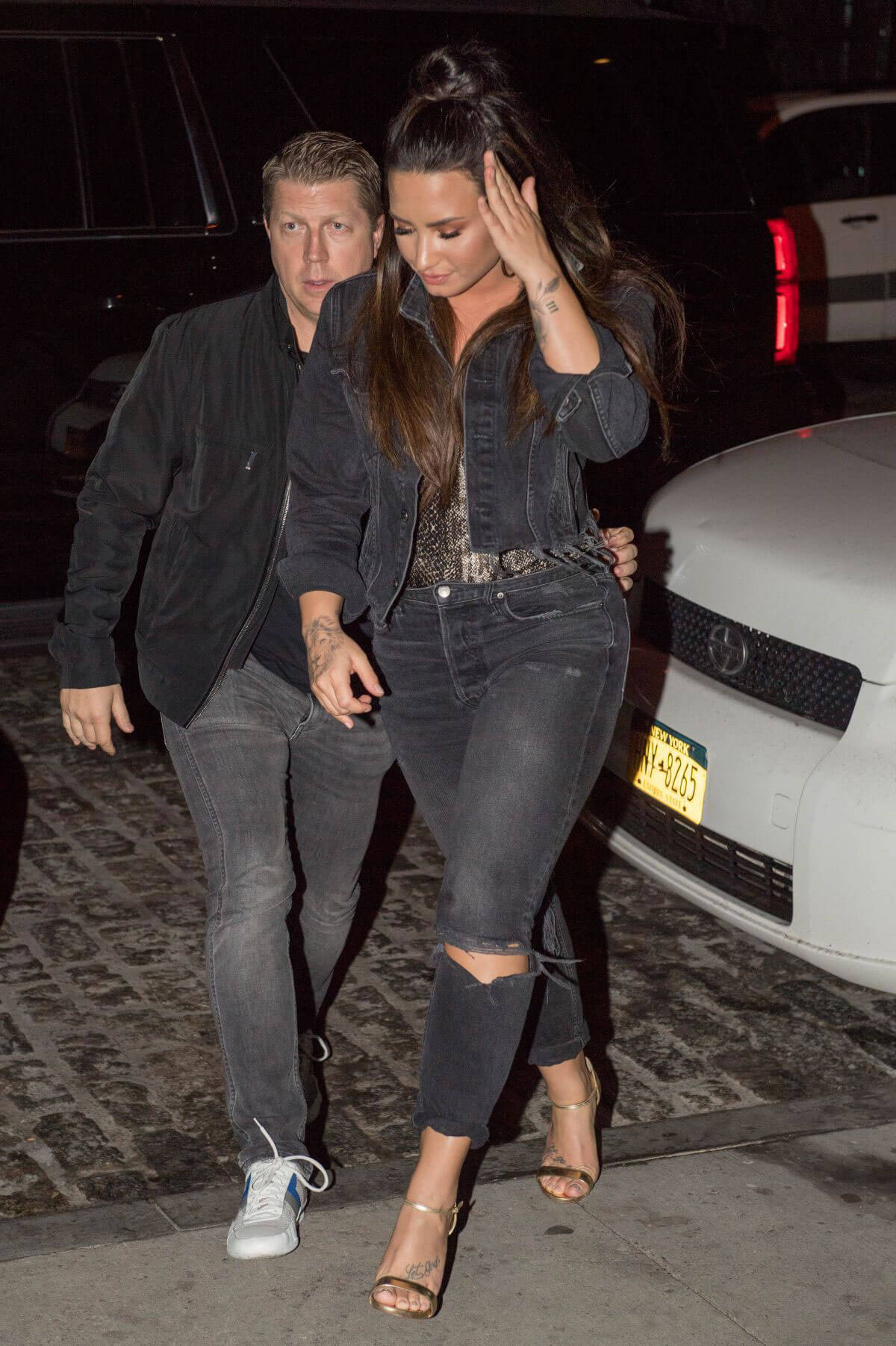 Demi Lovato wears Black Ripped Jeans Night Out in New York