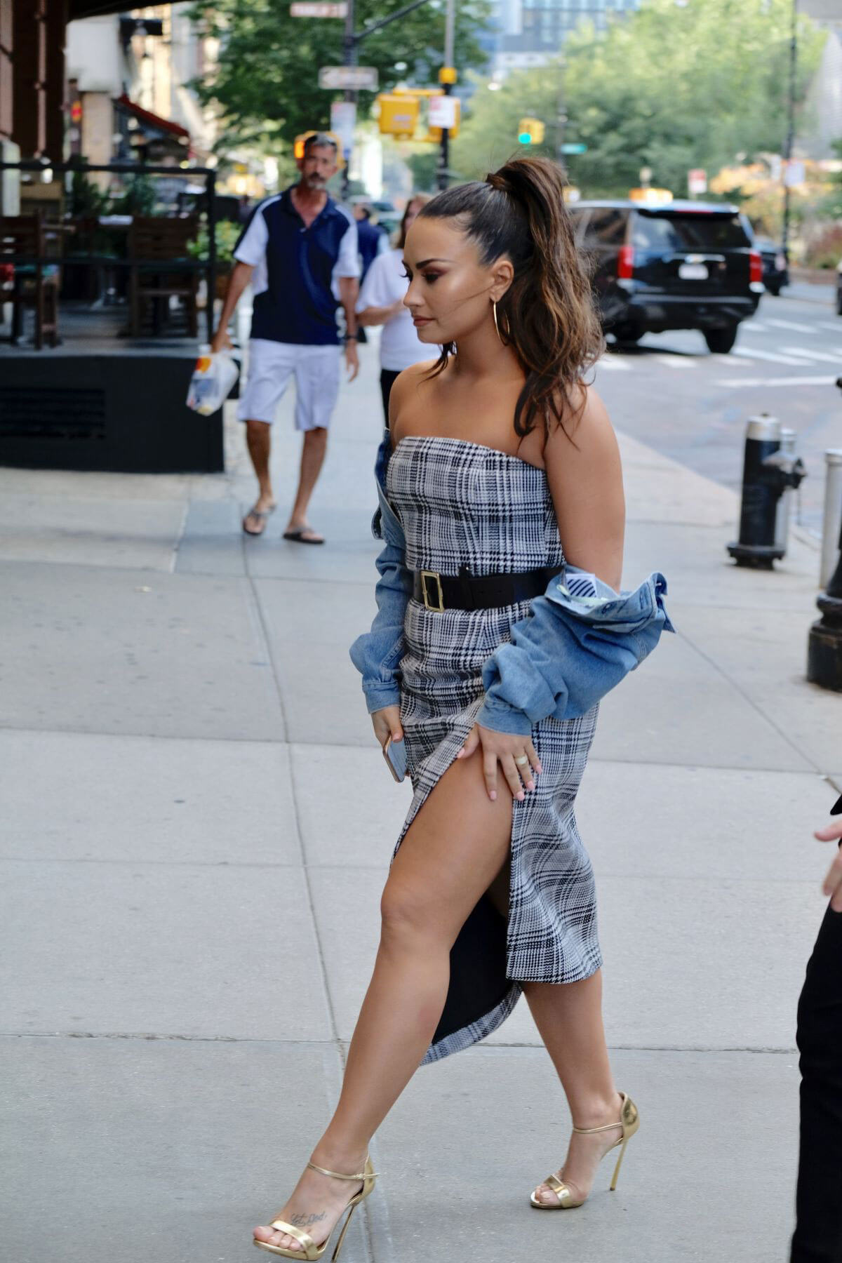 Demi Lovato wears Off Shoulder Dress Leaves Her Hotel in New York