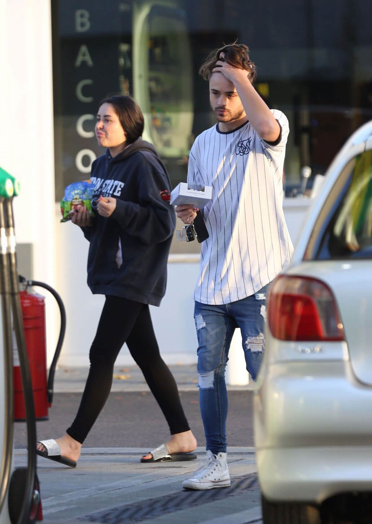 Marnie Simpson and Casey Johnson Stills at a Gas Station in London