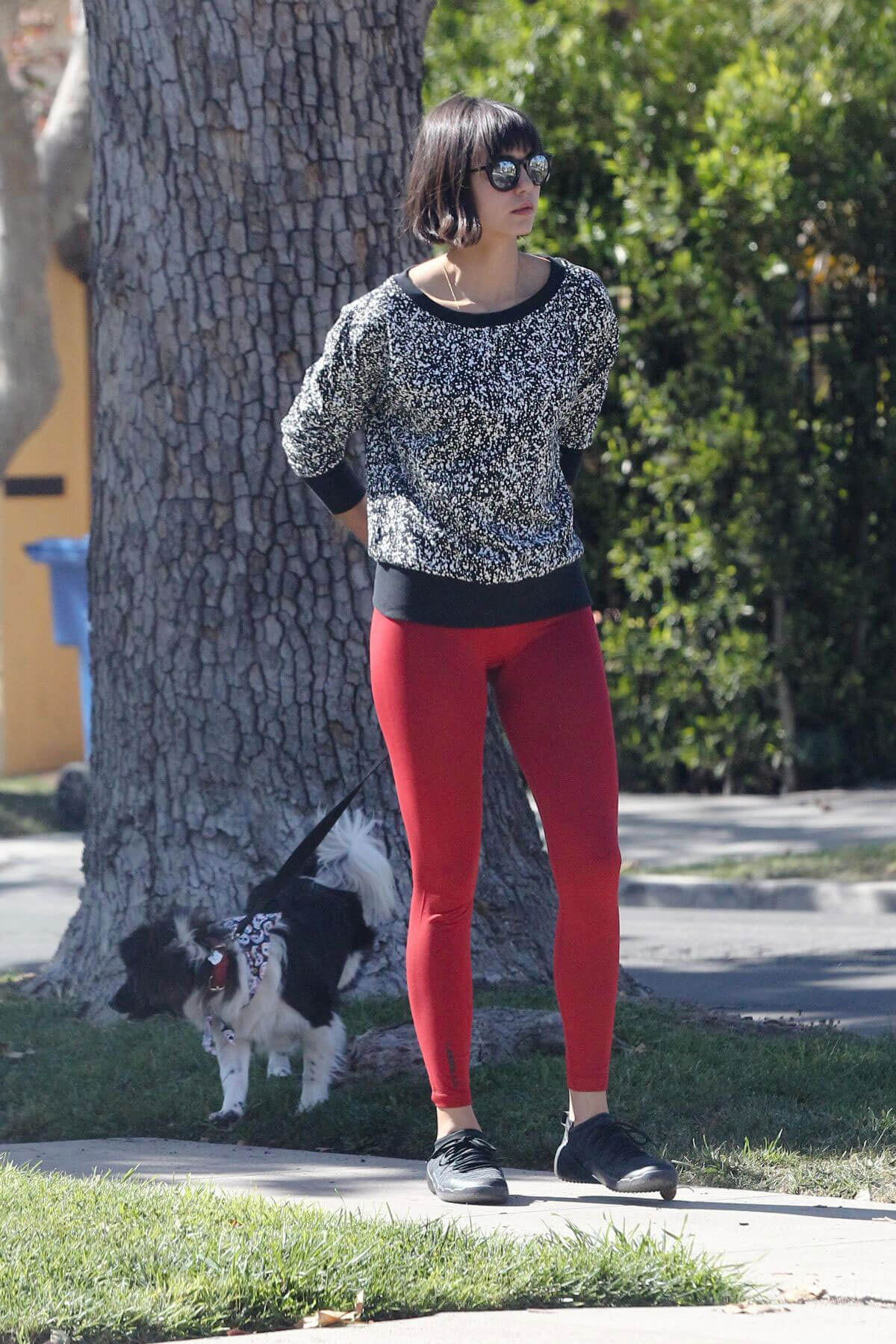 Nina Dobrev wears Red Tights Bottm Out with Her Dog in Los Angeles