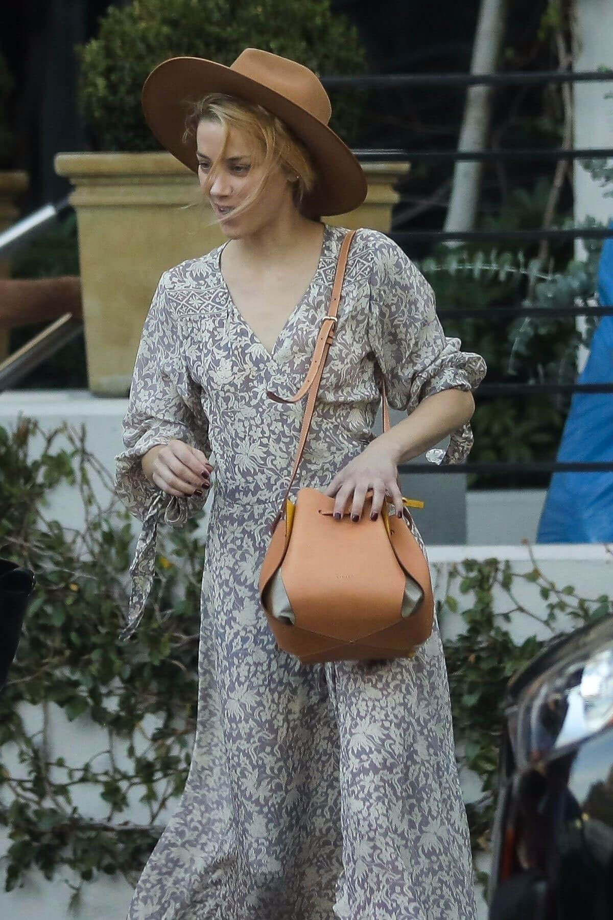 Amber Heard wears Floral Frocks Out and About in Hollywood