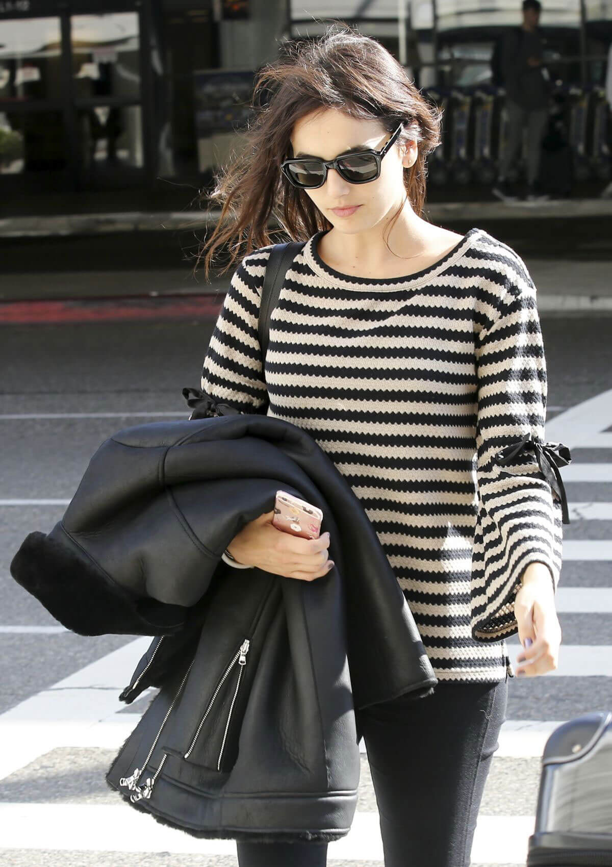 American Actress Camilla Belle Stills at LAX Airport in Los Angeles