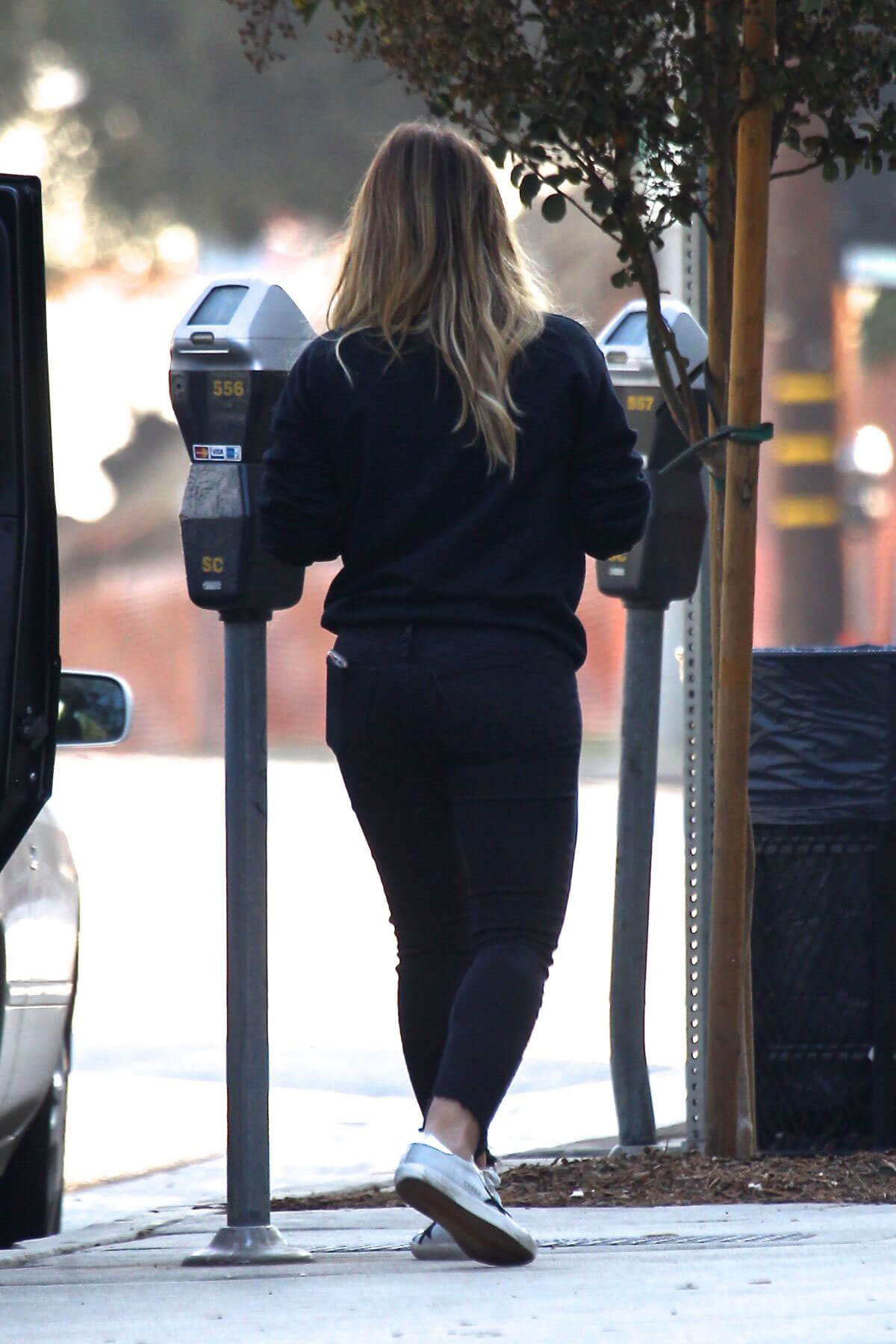 Hilary Duff wears Black Sweatshirt Arrives at Starbucks in Studio City