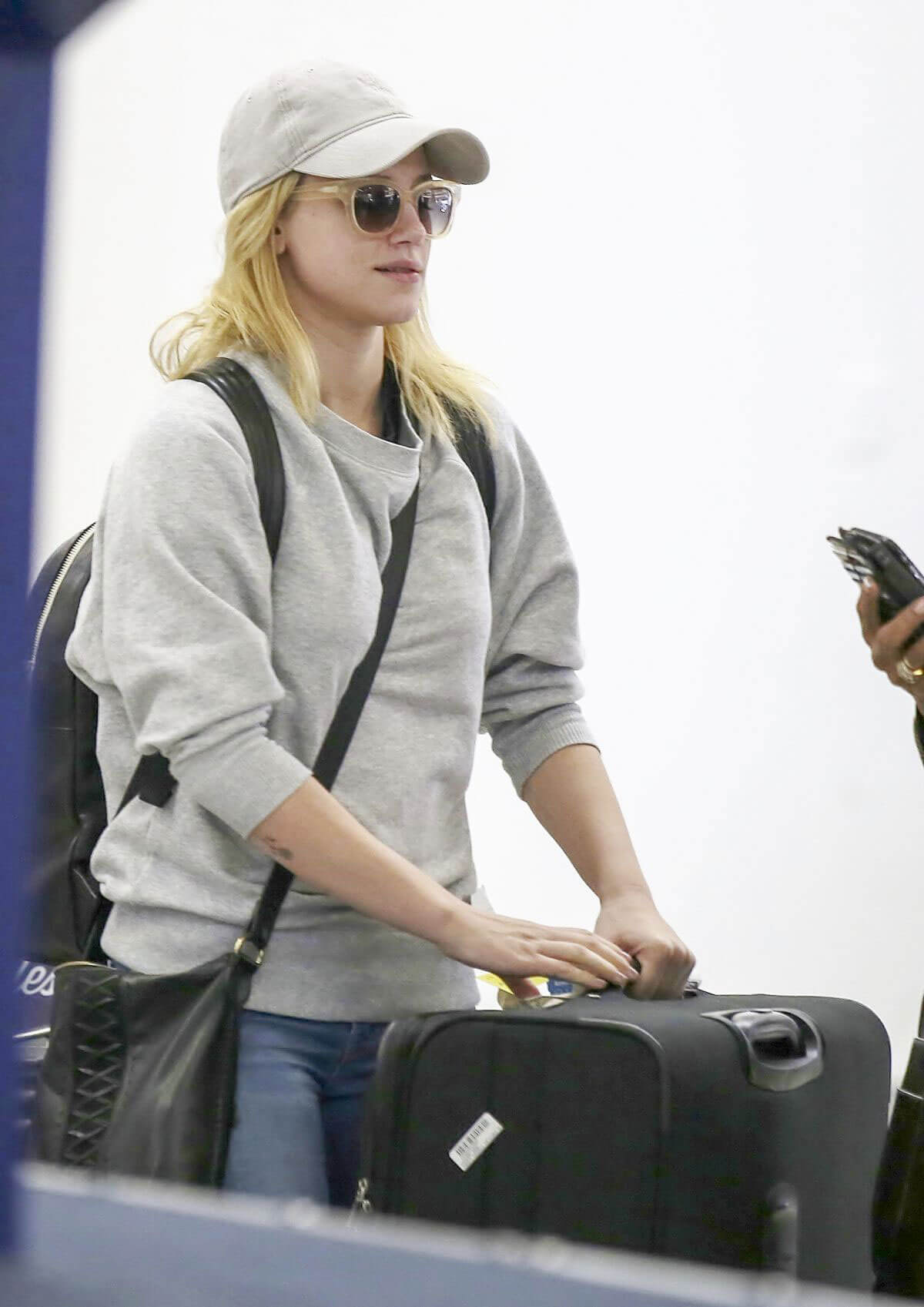 Lili Reinhart wears Grey Sweatshirt Stills at Los Angeles International Airport